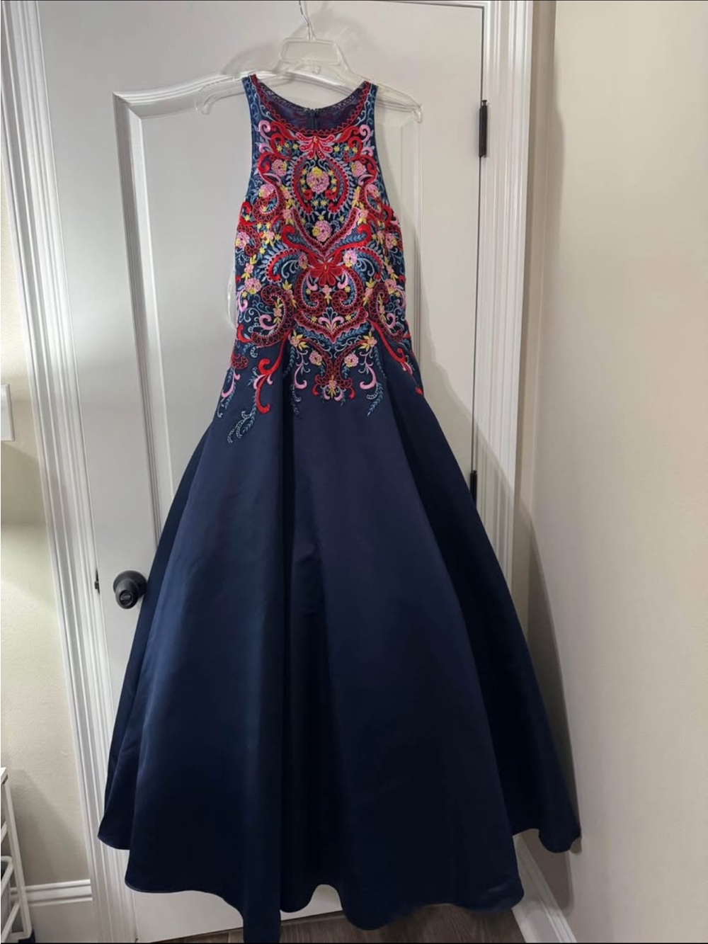 Tiffany Designs Navy Ball Gown with Vibrant Embroidered Bodice